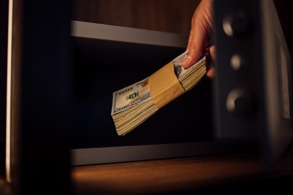 Putting money in the deposit box before leaving your hotel