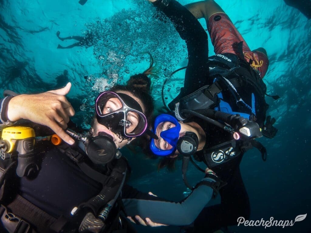 Couple scuba diving 